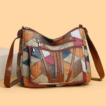 Bolso de mano de piel con mosaico