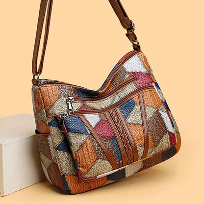 Bolso de mano de piel con mosaico